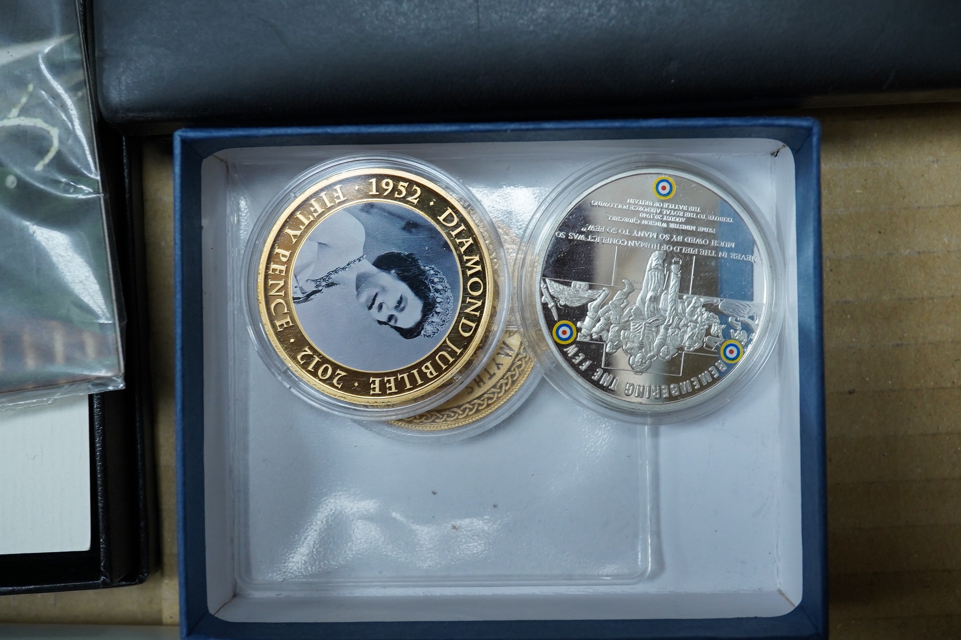 British and Commonwealth silver proof and BUNC coins, to include Canada 1oz. silver maple leaf shaped coin 2016, 2016 year of the three kings £5, two Royal Mint Sir Winston Churchill 2015 £20 coin, 2015 The longest reign